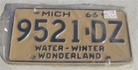 Pair of 1966 Michigan license plates.