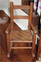 CHILD'S WOOD ROCKER WITH WOVEN SEAT