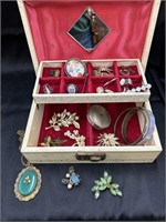 Vintage jewelry box full of costume jewelry