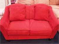 Two cushion deep red upholstered loveseat, 60"