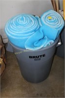 Brute garbage can full of blue foam