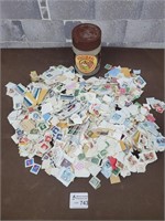 Stamp collection with vintage container