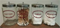 Vintage glass medical supply canisters