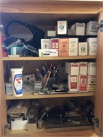Contents of cabinet. Coin supplies, office