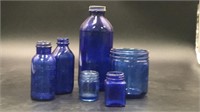 6 cobalt blue bottles/jars