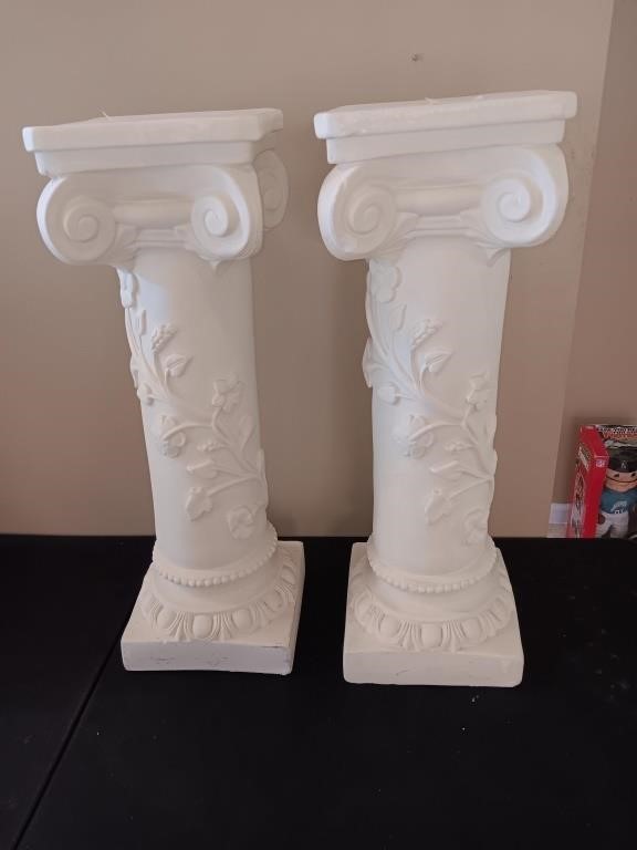 2 ceramic pedestals 29.5 inches tall one has