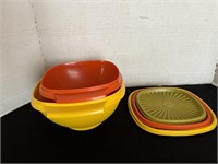 Tupperware bowls with lids (green bowl is