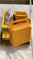 Tupperware box with stencils, FisherPrice toys