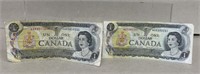 (2) Canadian one dollar bills