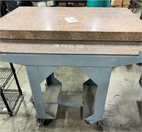 JM tool company marble top rolling table
