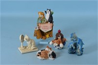 Assorted Cat Figurines and Dolphin Figurine