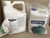 Herbicide and blue lake and pond colorant