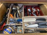 Drawer full of stainless flatware and more