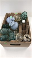 Box of insulators, some are chipped