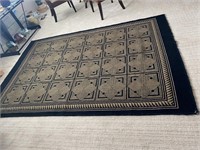 Black & beige area rug