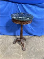 Marble topped claw foot stand table.