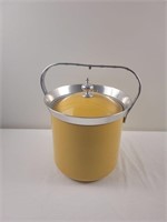 Gold-colored enamel and metal ice bucket