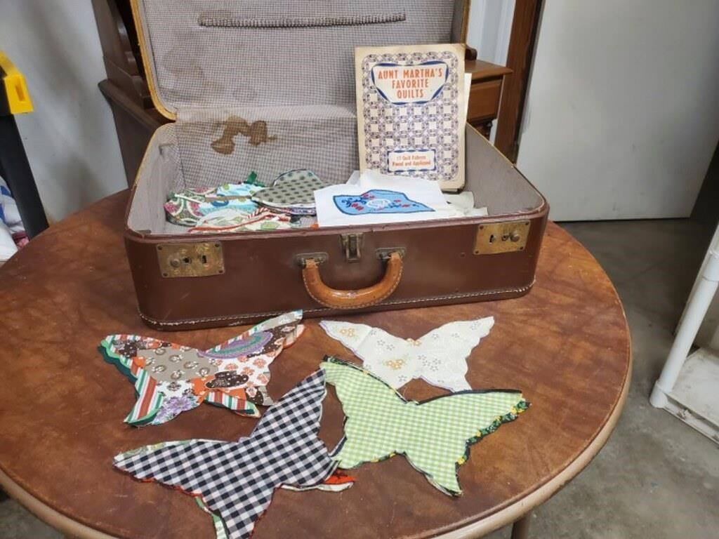 Suitcase of fabric appliques for