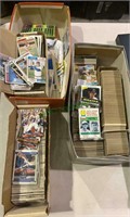 4 boxes of sports cards - baseball cards, football