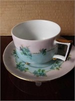 Footed cup saucer and plate