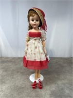 20 inch vinyl high heel doll with red shoes, hat,