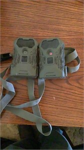 Trail cameras with straps