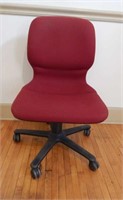 Red office chair with wheels