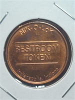 Copper restroom token