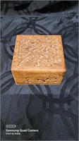 Ornately carved 3&1/2 × 3&1/2 × 2 wooden trinket
