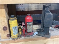 Two hydraulic jacks and one old jack