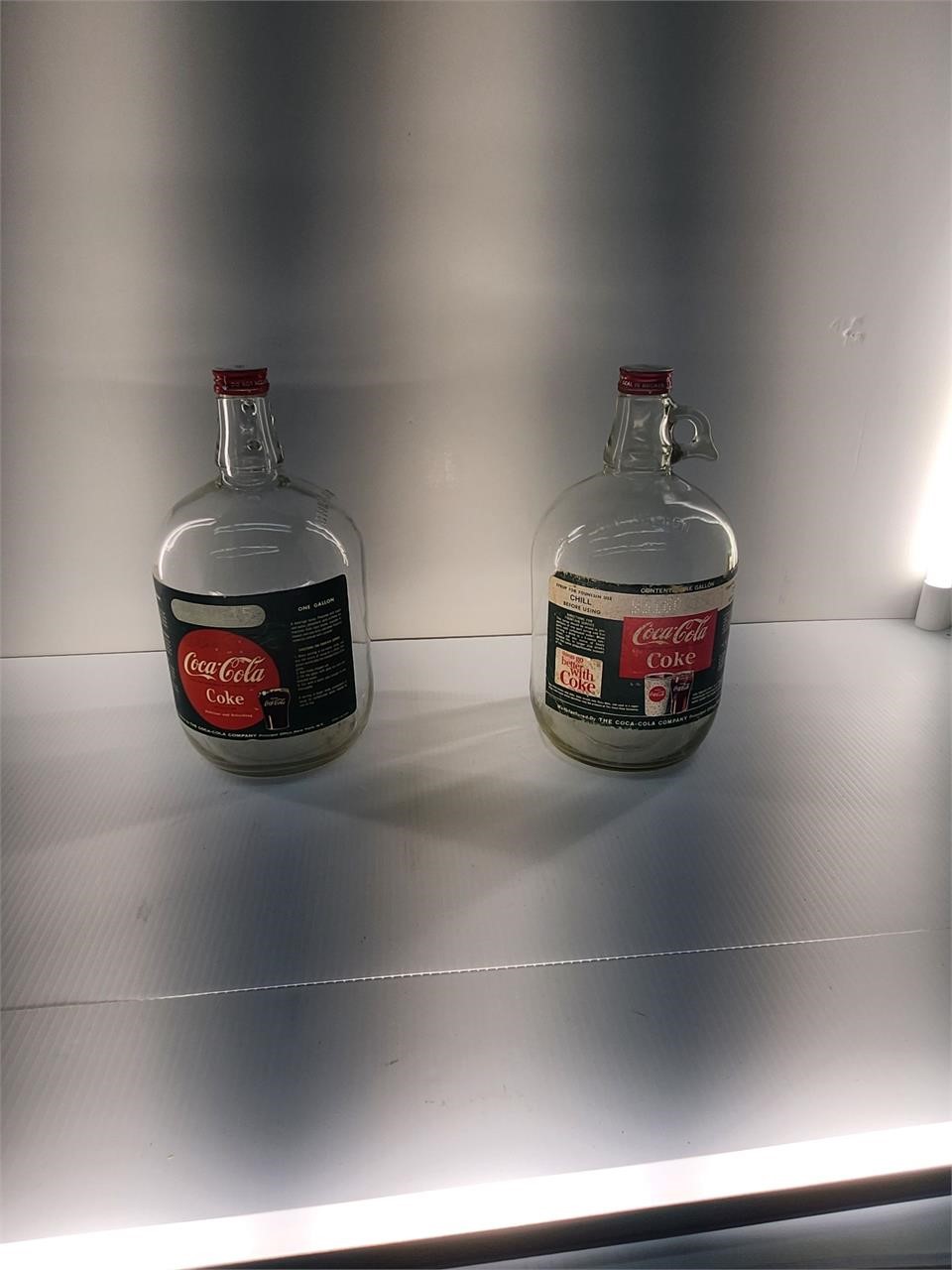 2 antique Coca-Cola syrup bottles 1 gal