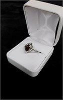 sterling oval shaped red stone ring