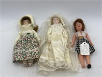 -2 small porcelain dolls, one small plastic