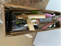 Wooden box with miscellaneous kitchen utensils