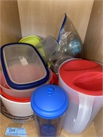 Contents in cabinet, plasticware, bowls and more