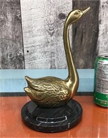 Brass swan on granite base