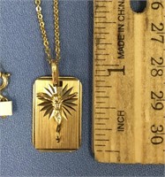 Gold crucifix, 14K pendant and chain, weight: 4.7g