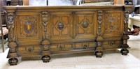 Cartouche and Lion Mask Carved Oak Sideboard.