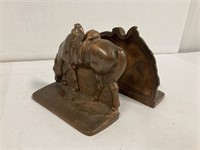 Cast iron horse book ends.