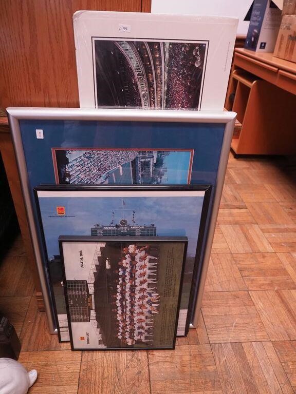Group of six framed sports-related photos