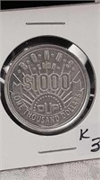Vintage oup $1,000 aluminum token