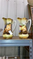 2- vintage fruit pitchers