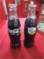 (2) Filled 8 fl. oz. Coca-Cola Classic Bottles