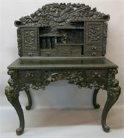 ORNATELY CARVED ASIAN DESK WITH BIRD FIGURES