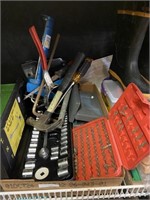 assorted tools including socket sets screwdriver