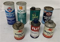7 assorted adv. tins w/ product