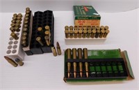 Group of assorted ammo and brass that includes 44
