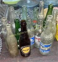 13 Vintage soda bottles- barqs, sun crest, hazle