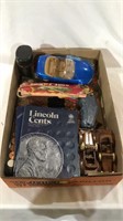 Lincoln cent books, remote control car, wood cars