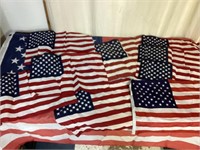 G) lot of 10 American flags nine of them measure